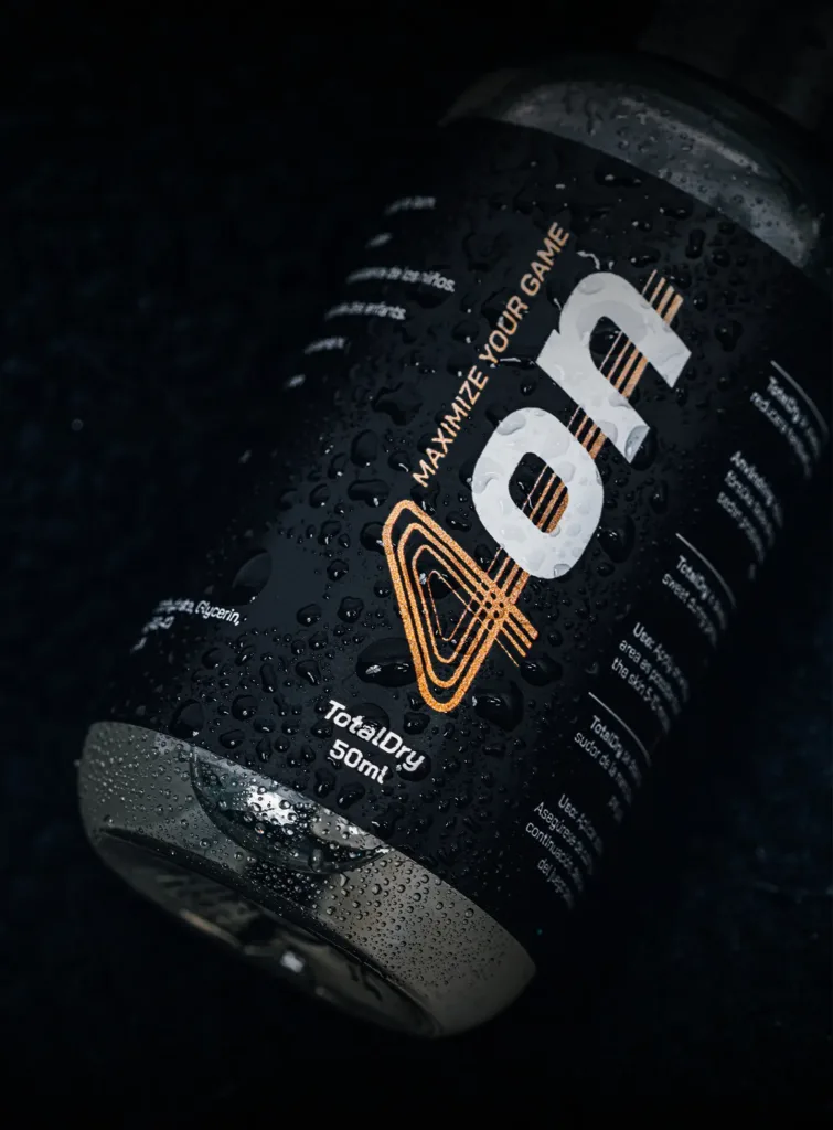 A bottle 4on TotalDry antiperspirant grip spray